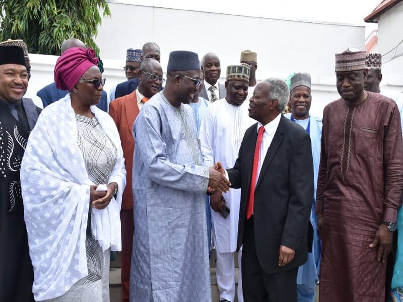 *  Kumuyi being received by Ahmed Ketso on behalf of Governor Bello of Niger state.
