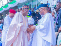  Nigeria's President of Senate, Senator Godswill Akpabio (right) in a congratulatory handshake with APC National Chairman, Dr Abdullahi Ganduje on his 74th birthday.