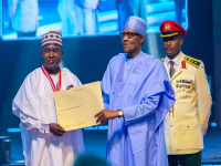 *  L-R:  Brig-Gen. Mohammed Buba Marwa, Chairman of the National Drug Law Enforcement Agency (NDLEA) receiving his National Honours Award from President Muhammadu Buhari on Tuesday.