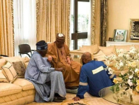 Tinubu in a hearty chat with Babangida on Monday while Gov Bago, sitting on the floor, listens