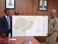 *  L-R:  Dr. Bashir Gwandu, Executive Vice Chairman, National Agency for Science and Engineering Infrastructure (NASENI), receiving from Dr. Abdulrazak Garba, Director-General, Nigerian Geological Survey Agency (NGSA), a geological map containing locations of solid minerals in Nigeria during a working visit to the NASENI Headquarters, Abuja on Monday. Photo: NASENI.