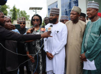 *  New NASENI Boss, Khalil Suleiman Halilu (middle), addressing the press on assumption of duty last Friday at the NASENI headquarter, Abuja. Beside him are top officials of the Agency.
