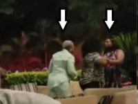 *  Picture of the fight between the angry wife and side chic at the hotel.